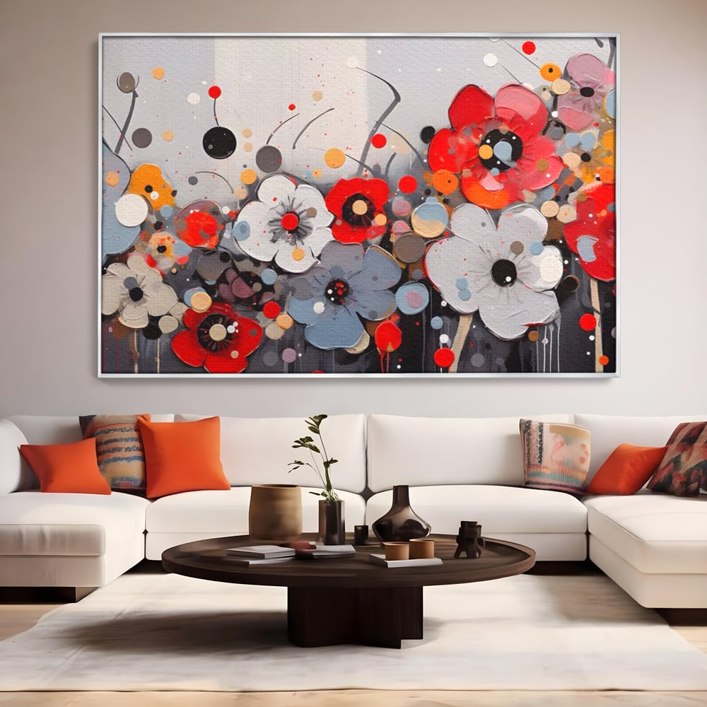 Tablou canvas cu pictura canvas cu flori colorate in relief, in rama de aluminiu argintiu, pe perete intr-un living